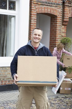Same-day removals team loading furniture for a Wimbledon home move