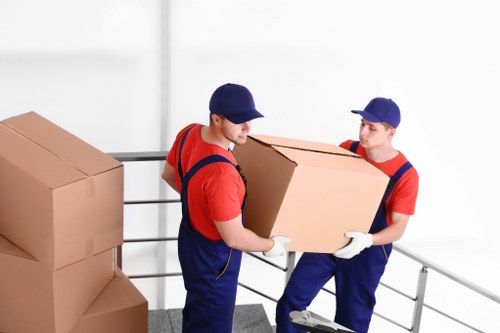 Moving team preparing a removal van in Wimbledon for loading