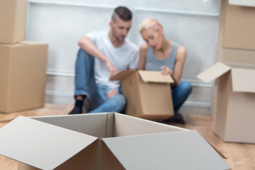 Local removals team handling furniture and boxes in Wimbledon