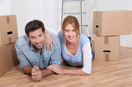 Professional removals team working at a Wimbledon flat with stairs