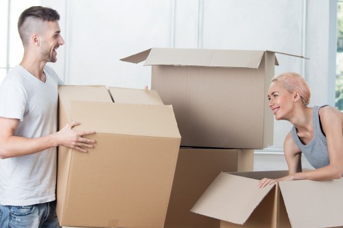 Loading boxes and household items into a van in Wimbledon