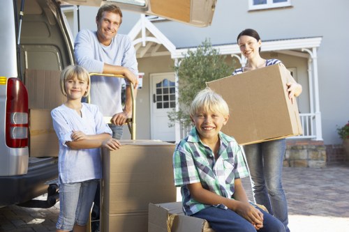 Local Wimbledon removal van team handling belongings carefully
