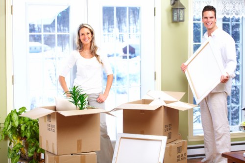 Packed removal van Wimbledon interior with secured furniture and boxes